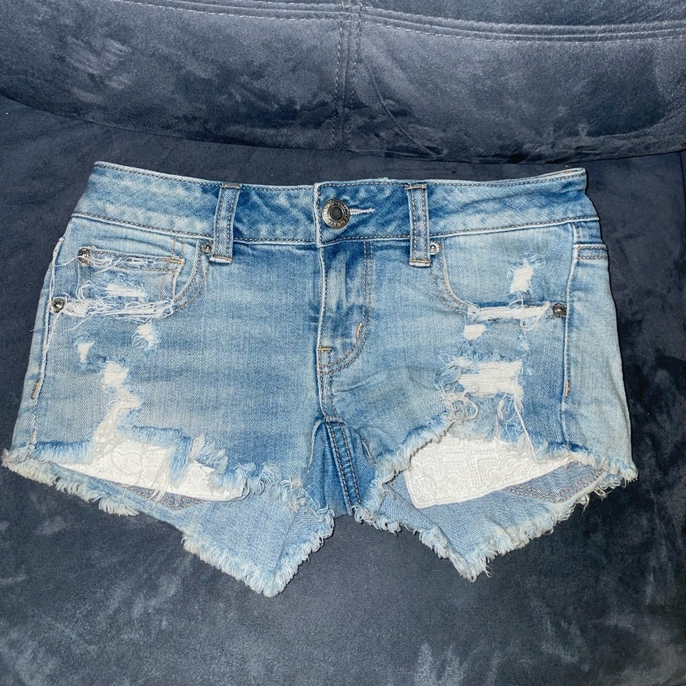 American Eagle Outfitter’s Denim Blue Distressed Stretchy Shorts Size 00 Women